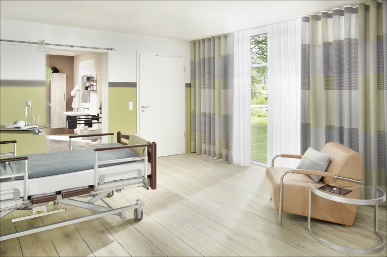 Grau und Currygelb lassen das Pflegezimmer freundlicher erscheinen...